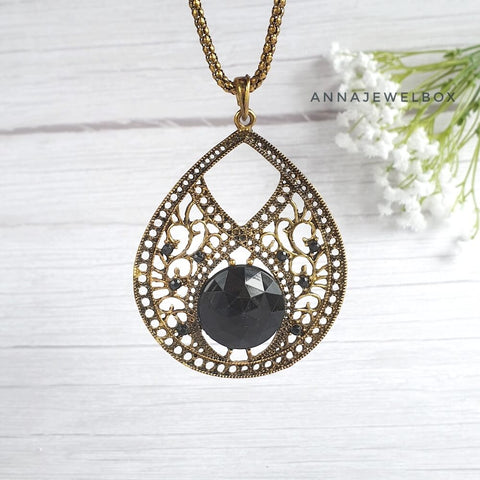 Image of Silver and Gold Teardrop Pendant Necklace